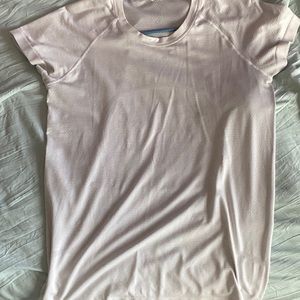 Lululemon white swiftly tech size 10 but could fit a 12.